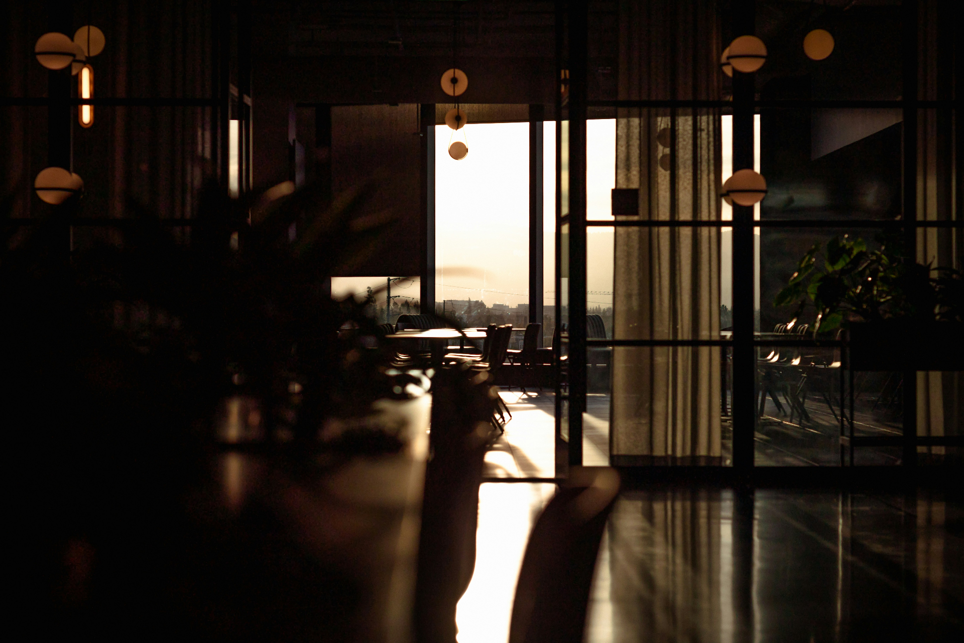 Featured property — restaurant interior at golden hour